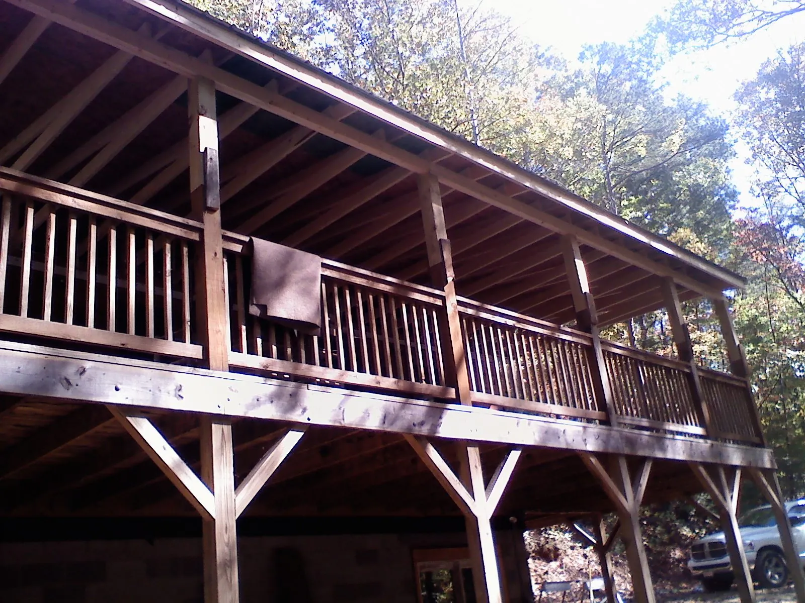 Timber framing under a new elevated porch and deck — Roof Leak Repair in Gardena by Roofing Brothers